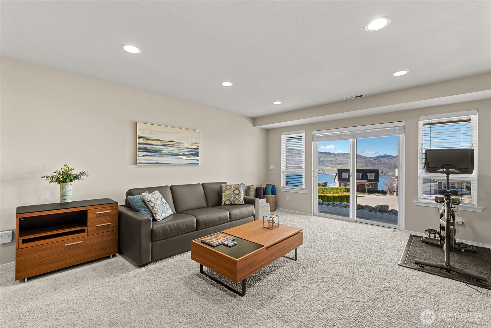The family room offers versatile flex space to meet your needs while you enjoy Lake Chelan views!