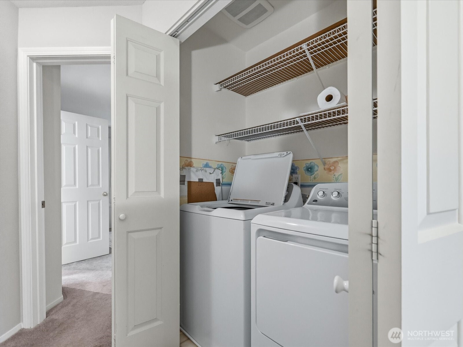 Laundry located on top floor, adjacent to bedrooms.