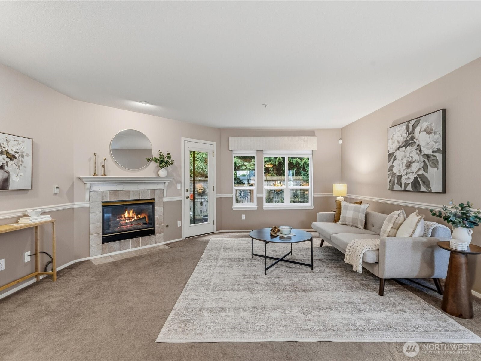 Spacious living room with cozy fireplace.