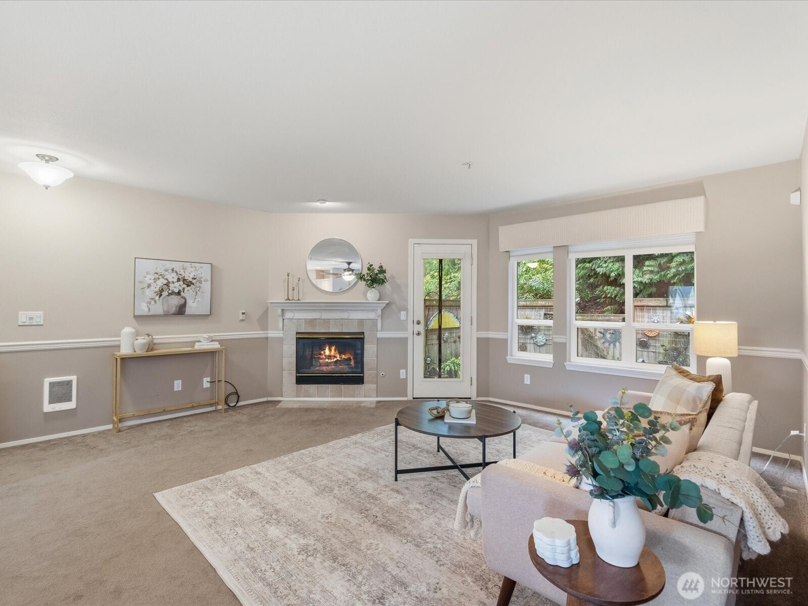 Private back patio off living room.