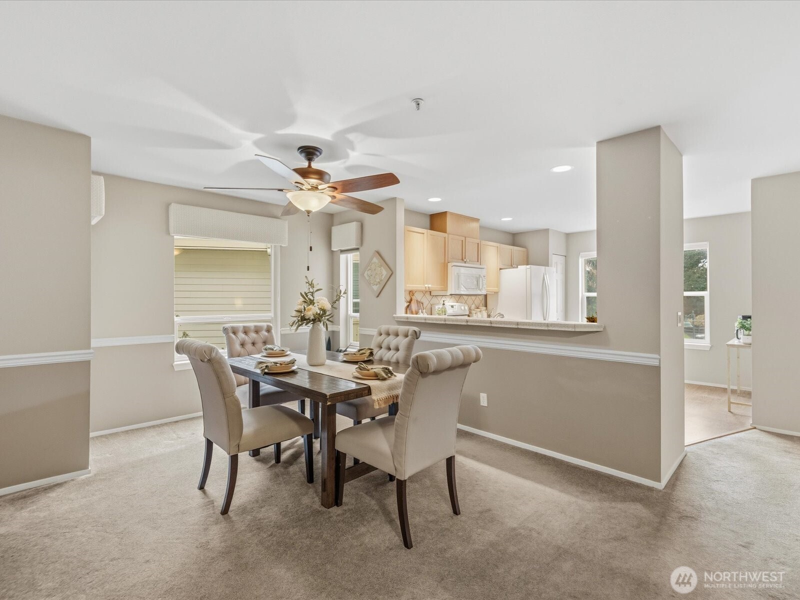 Dining room conveniently located between living room and kitchen.