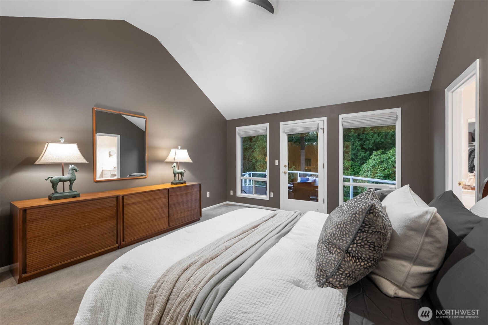 Coveted main floor primary bedroom offers function & flexibility.
