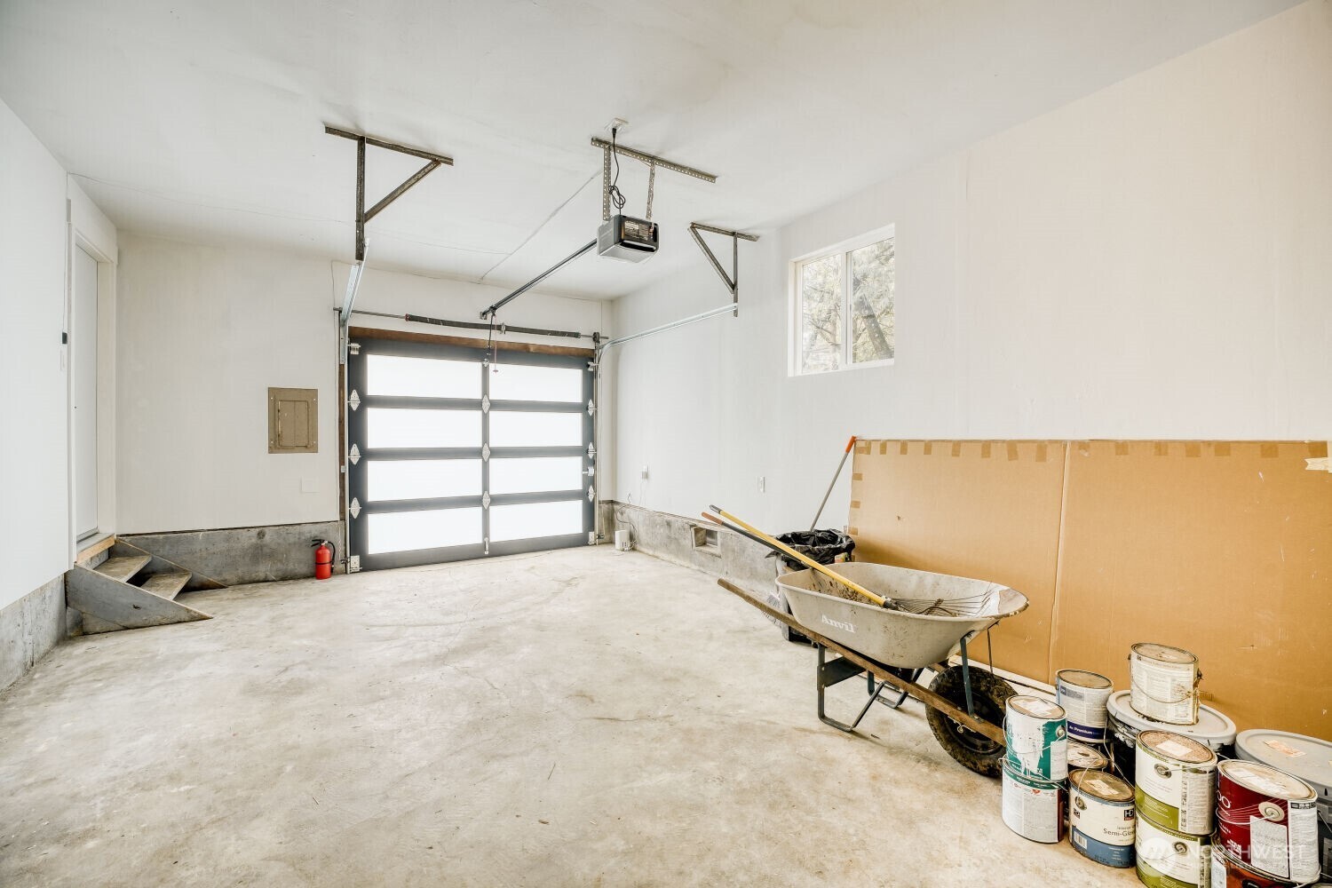 Oversized garage with work space.