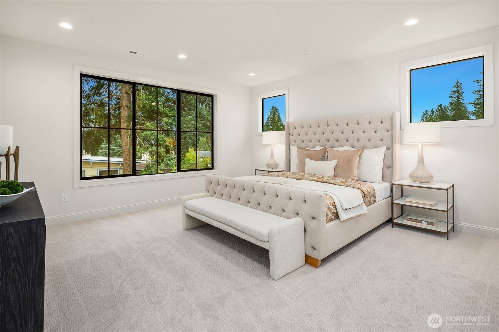 Designer primary suite with five-piece bath with heated floors