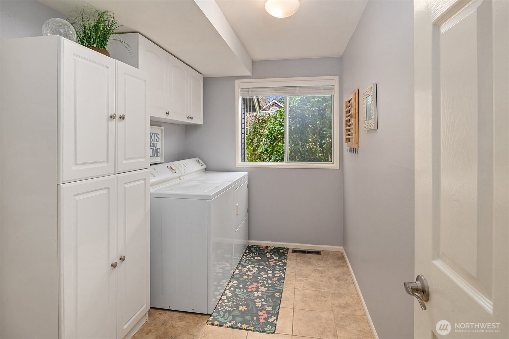 Main floor laundry that leads to the 2 car garage