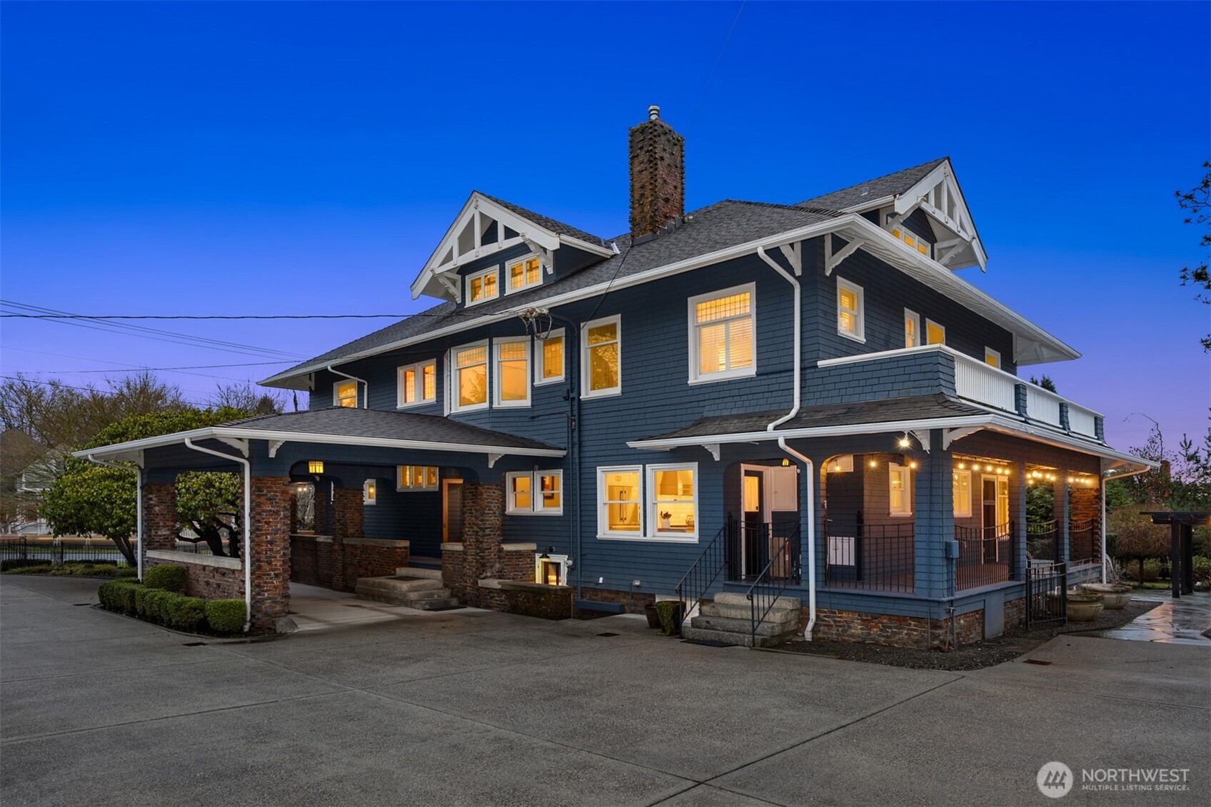 Architectural depth and craftsmanship unfold from every angle. Expansive porches, dormered rooflines, and rich shingle siding highlight the scale and versatility of this historic estate, thoughtfully designed for both grand entertaining and everyday living.