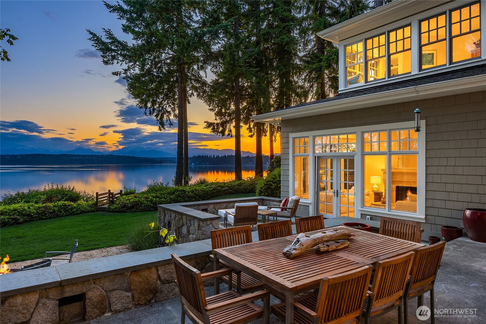 Enjoy summer evenings on the large, two-level patio with French doors at either end.