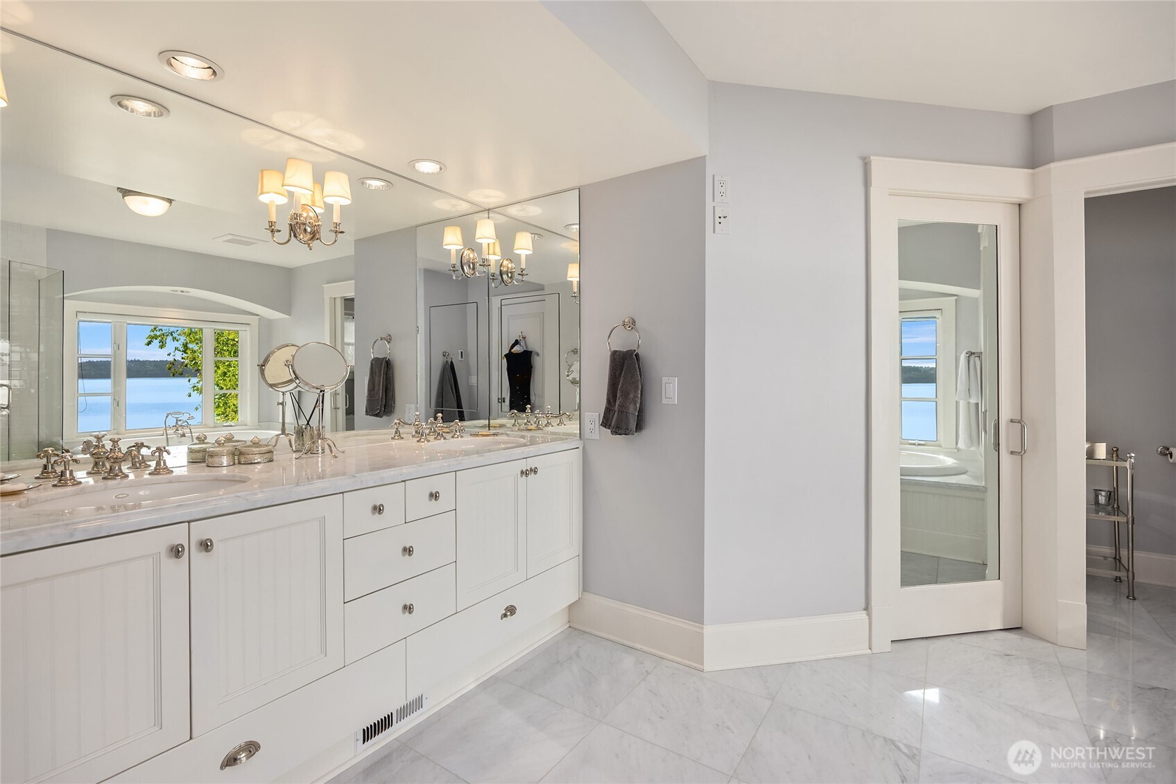 Lots of storage in the primary bathroom with separate water closet.
