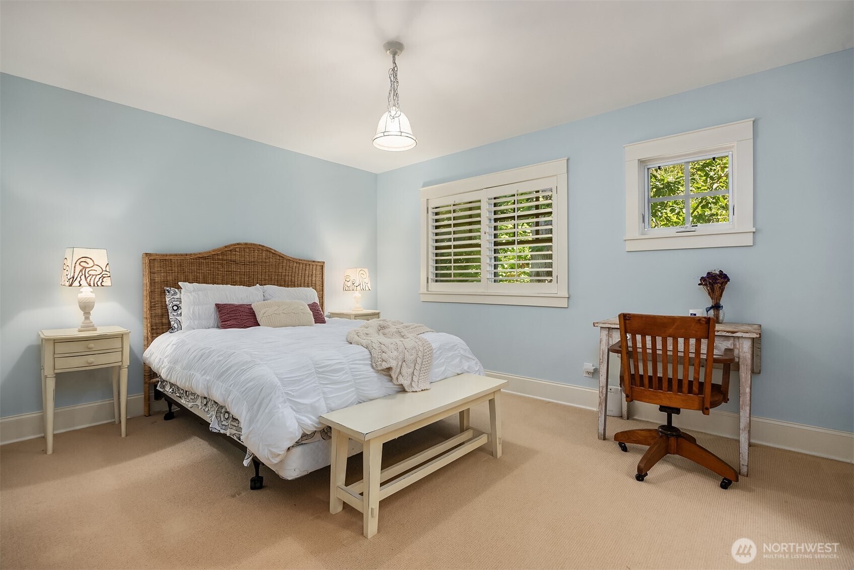 This bedroom faces the front yard and garden. There is an ensuite fukk bathroom and walk through closet.