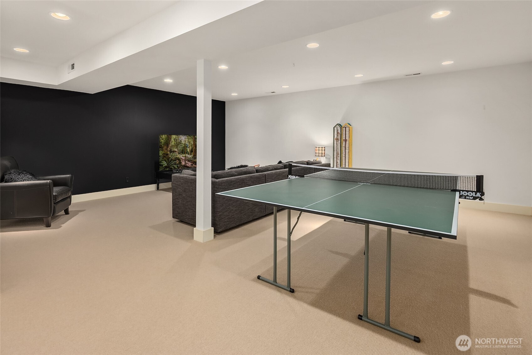 The finished basement is perfect for movies and a lively game of table tennis.