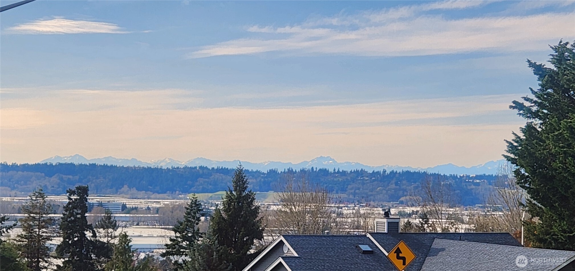 Cell phone picture of the Cascade Mountains from in front of the house