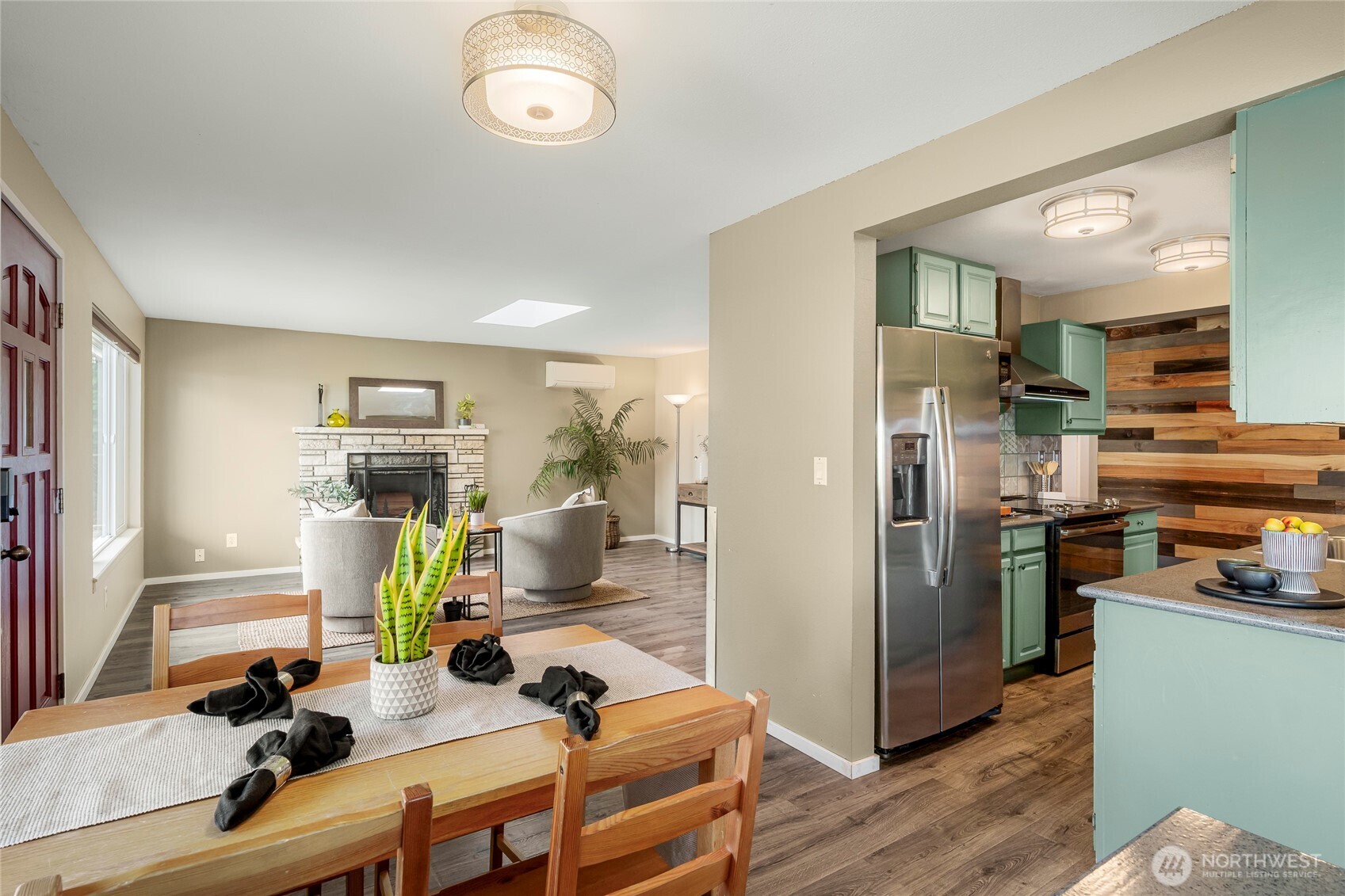 Dining space looking towards kitchen and living room