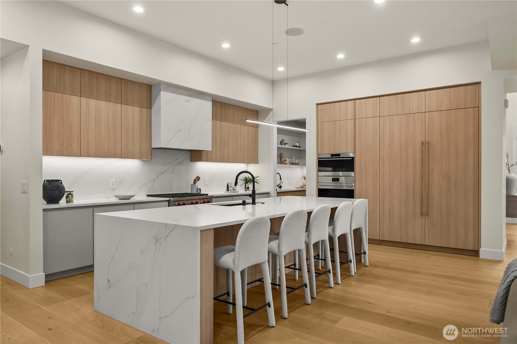 Chef’s kitchen with Sub-Zero fridge, Wolf cooktop