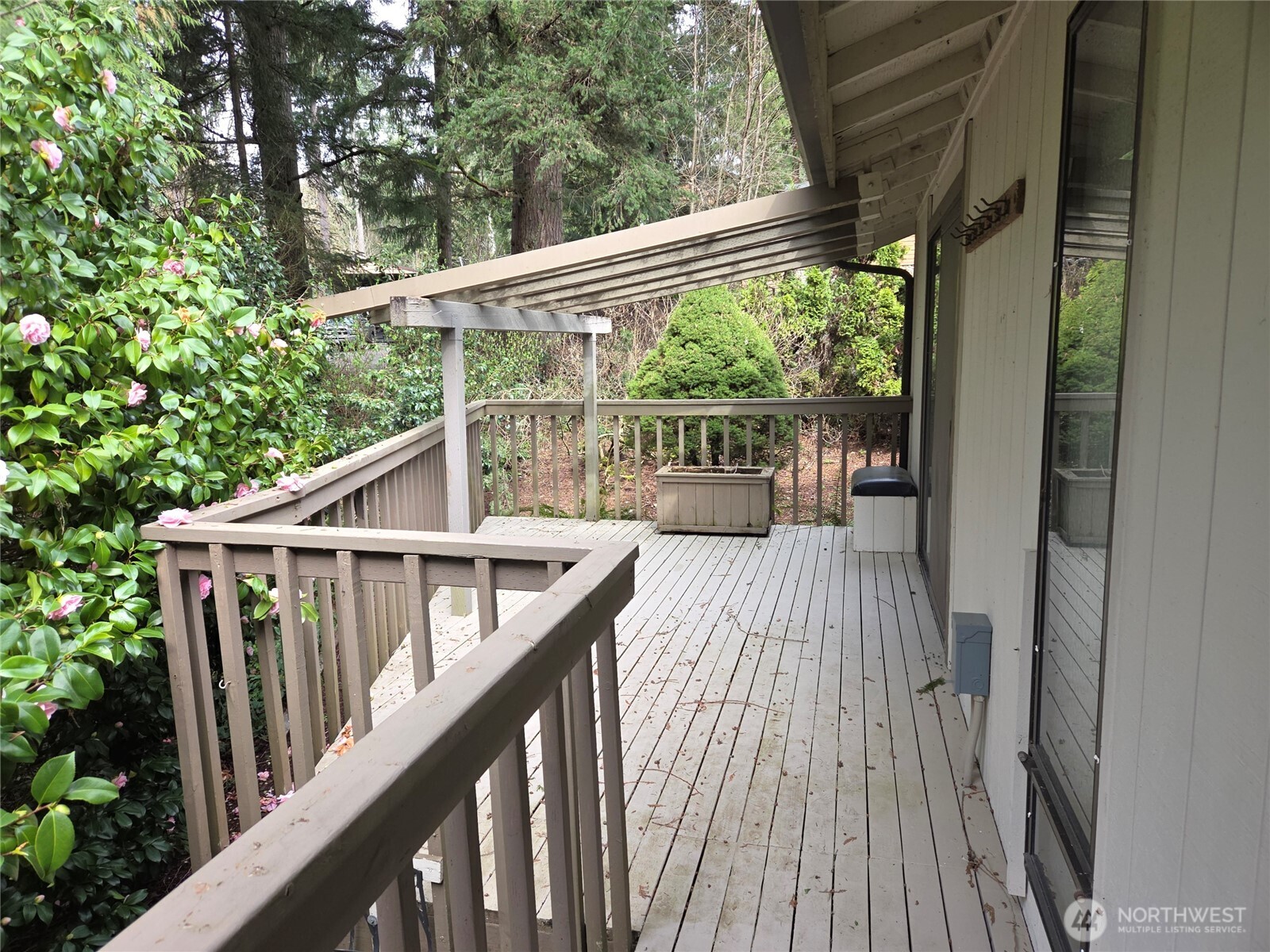 This Covered part of the deck off the primary had a hot tub at one time, its the perfect place to add one.