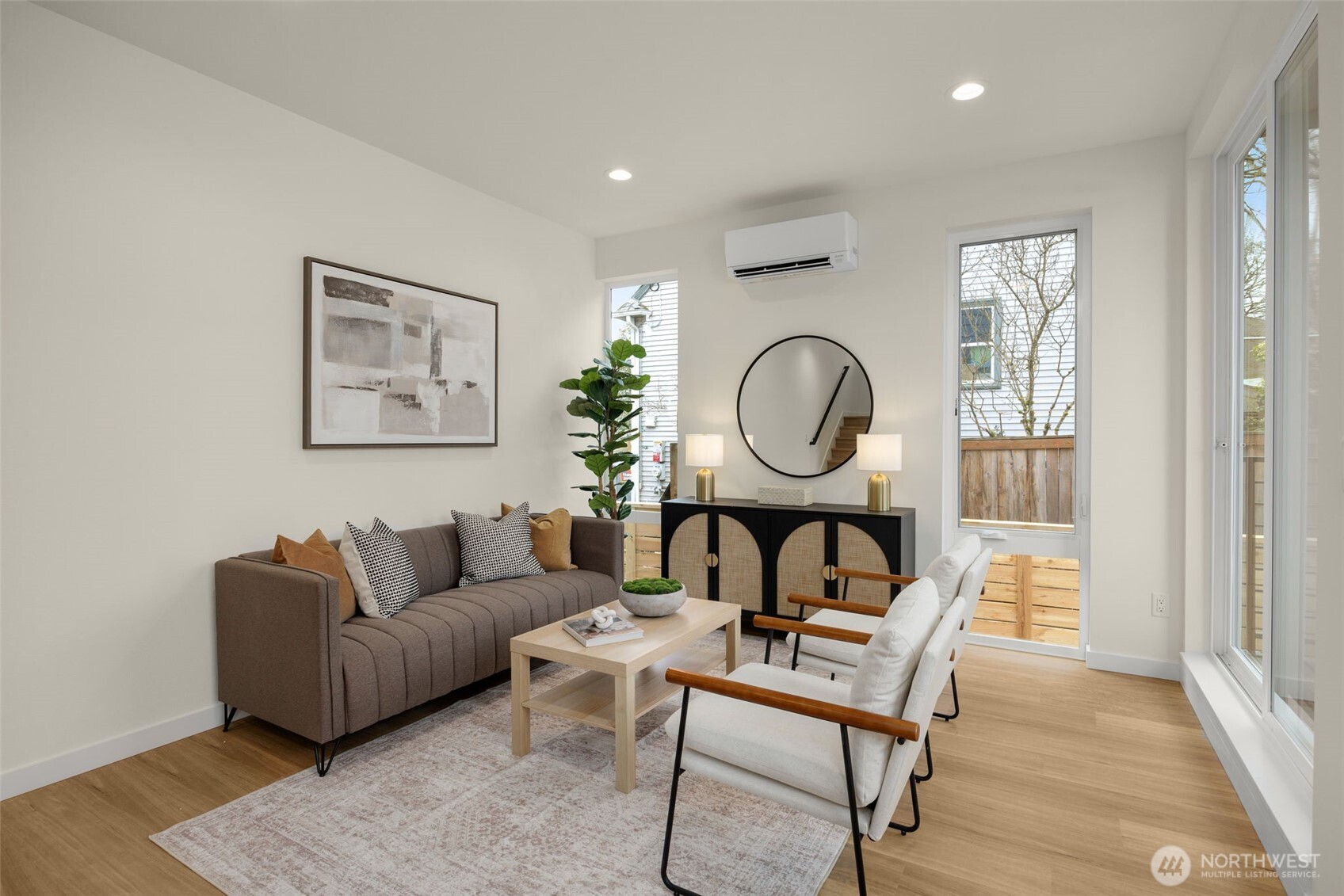 Kitchen opens to living and dining areas.