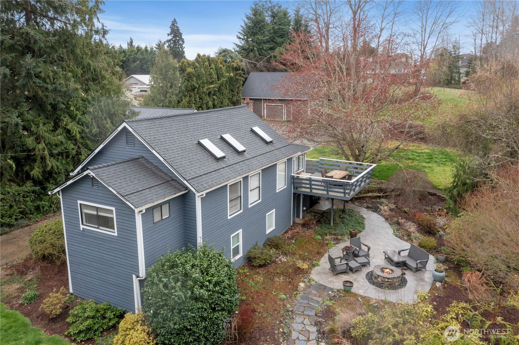 Enjoy your backyard patio complete with fire-pit.