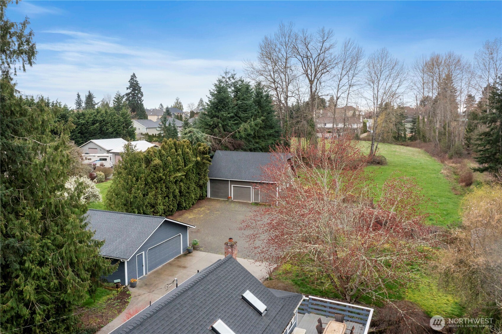 Over two acres with level pasture area.