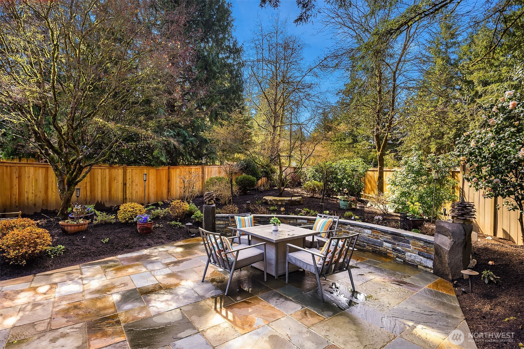Custom Stone Patio and Landscaped Back Yard