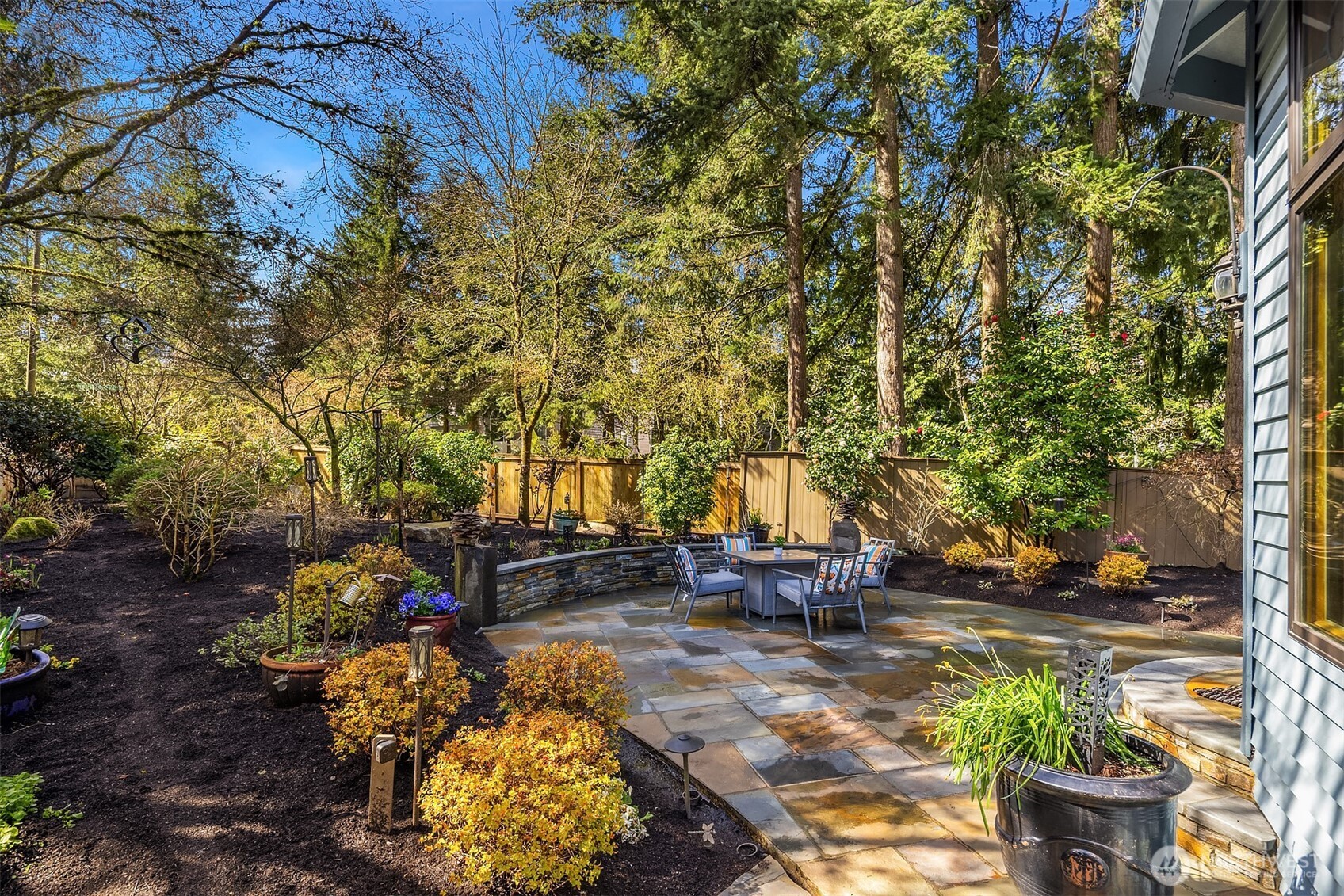 Custom Stone Patio and Landscaped Back Yard
