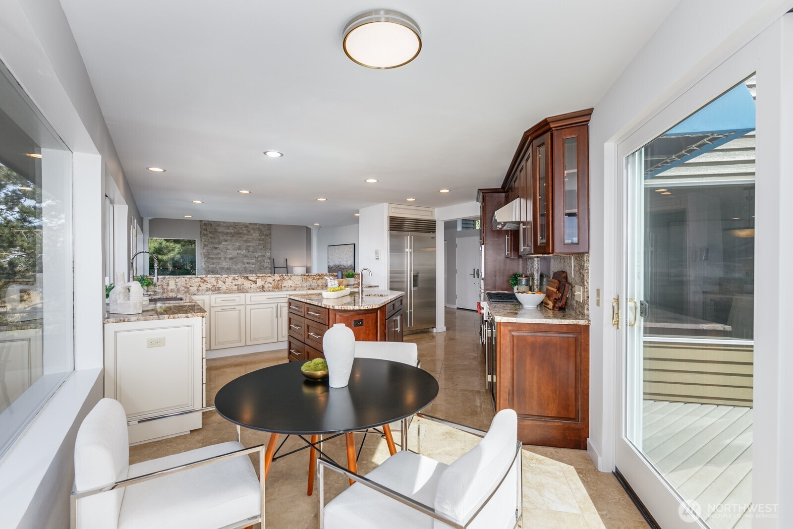 Breakfast nook with sound views and walks out through the slider to the south facing deck that has great sun exposure.