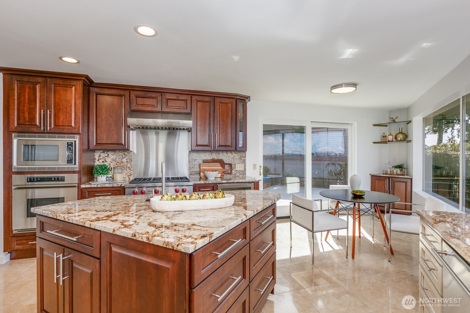 Very upscale cabinetry with SS pulls to protect the finish.