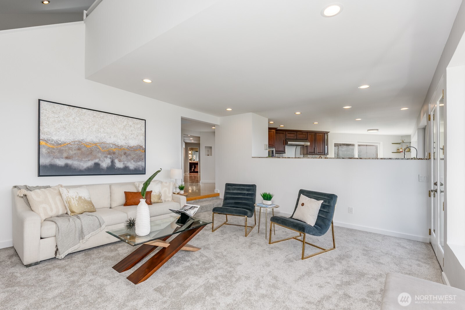 Looking back to the entry and kitchen.