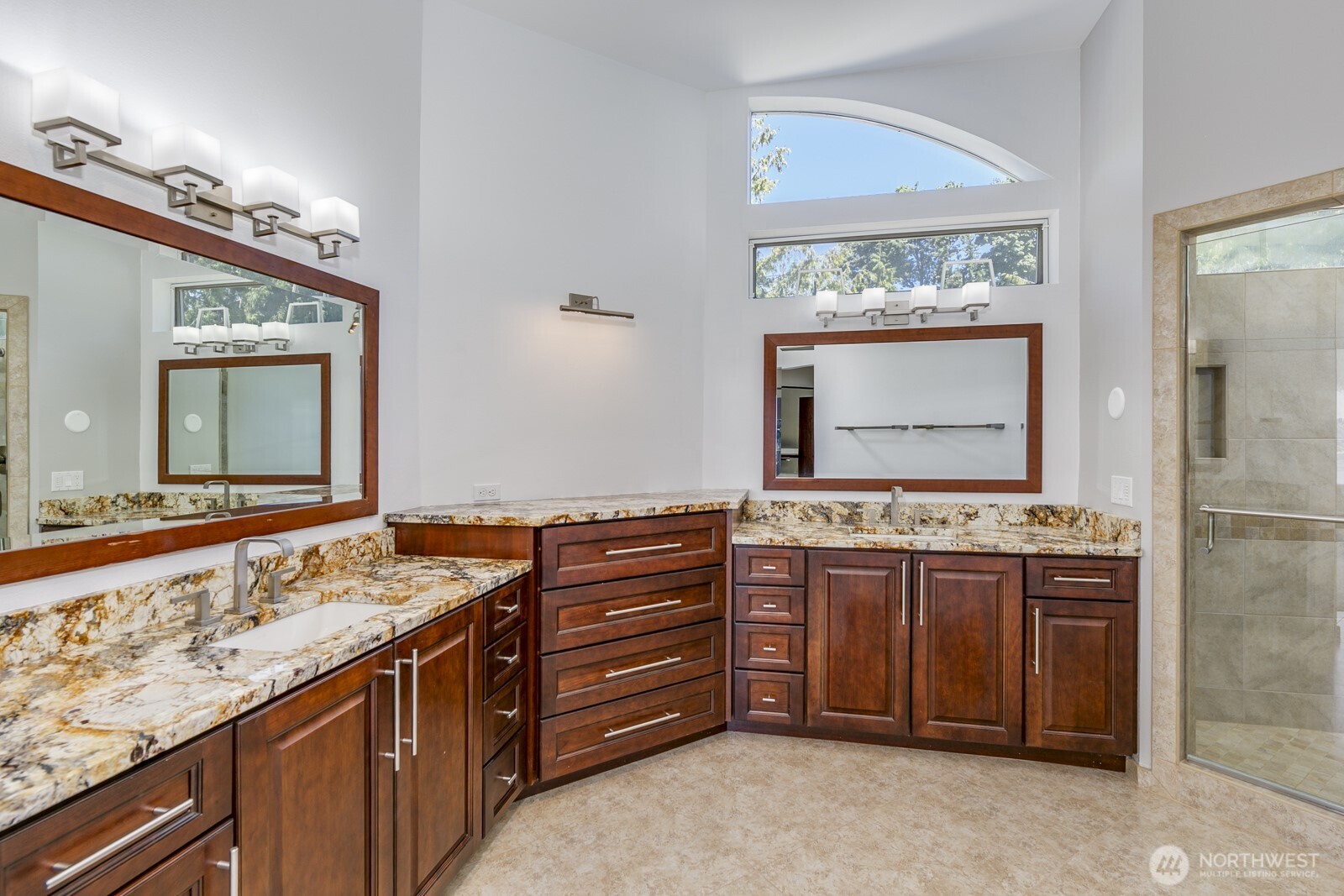 Totally remodeled with dual vanity sinks.