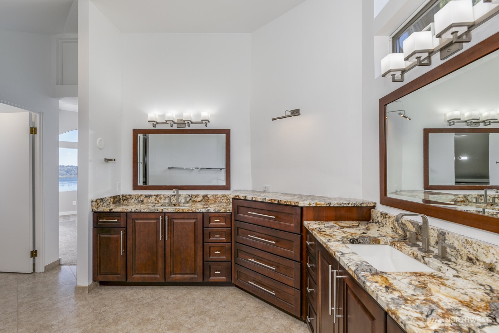 And a third vanity sink! The walk in closet is to the left.