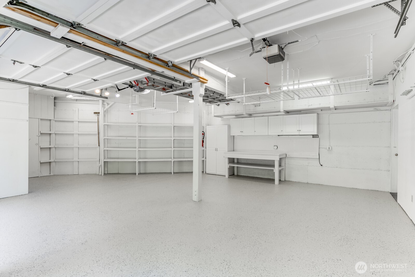 The 2 car garage is freshly painte including the floor. Lots of storage.