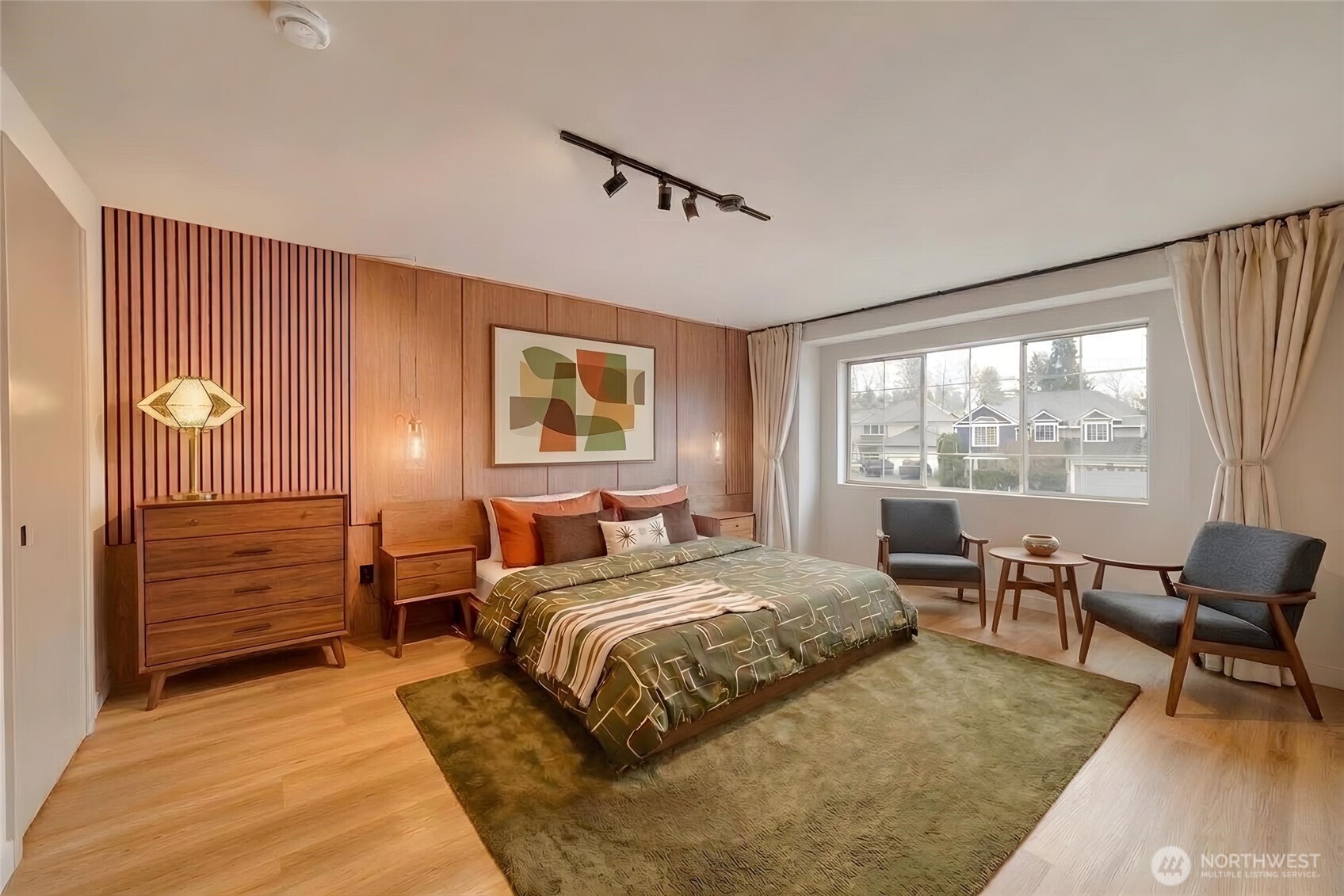Grand master bedroom with timeless mid-century modern design and generous proportions (virtually staged).