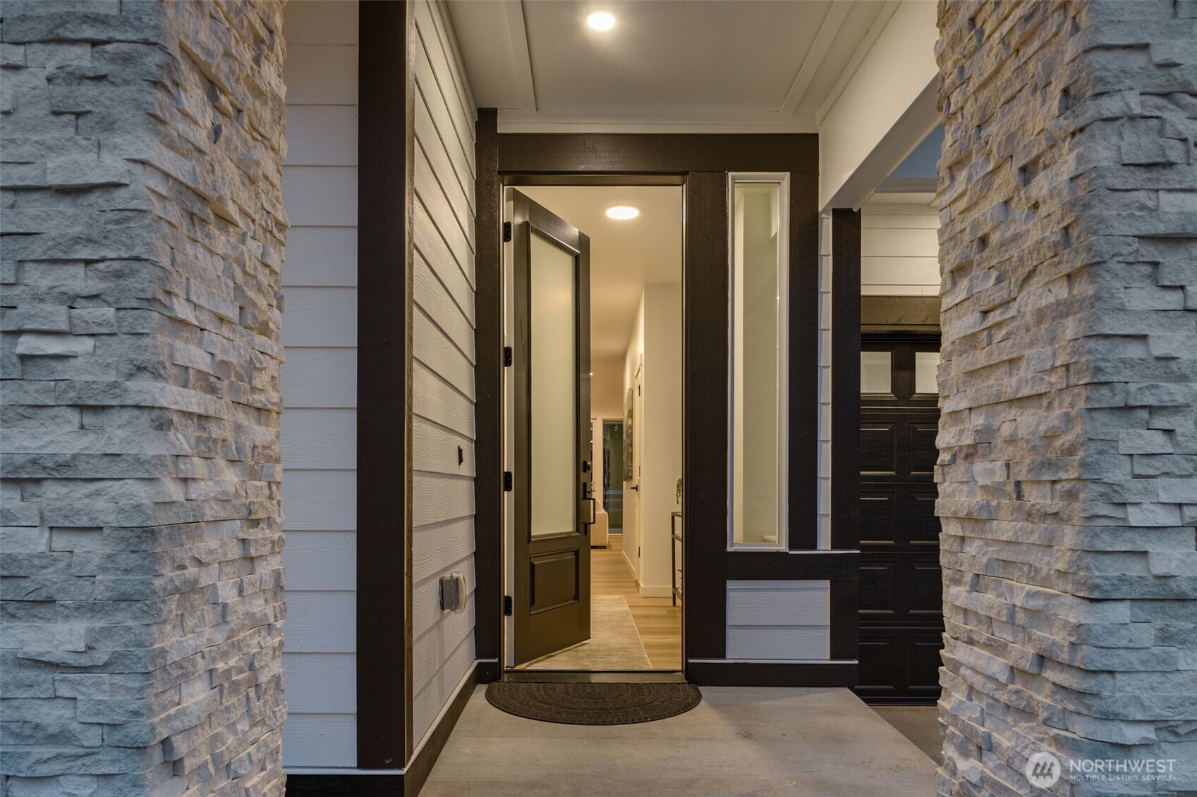 Photos of completed model on homesite #11 with identical floorplan.