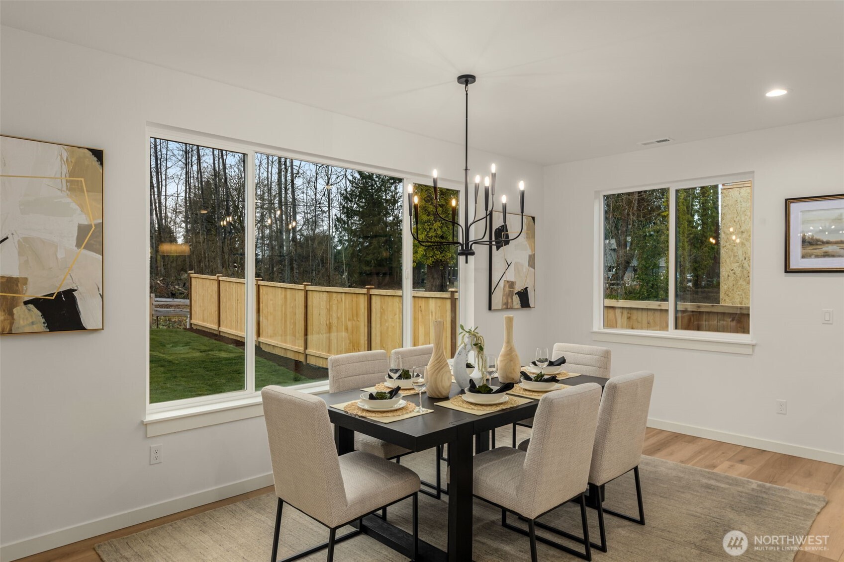 Photos of completed model on homesite #11 with identical floorplan.