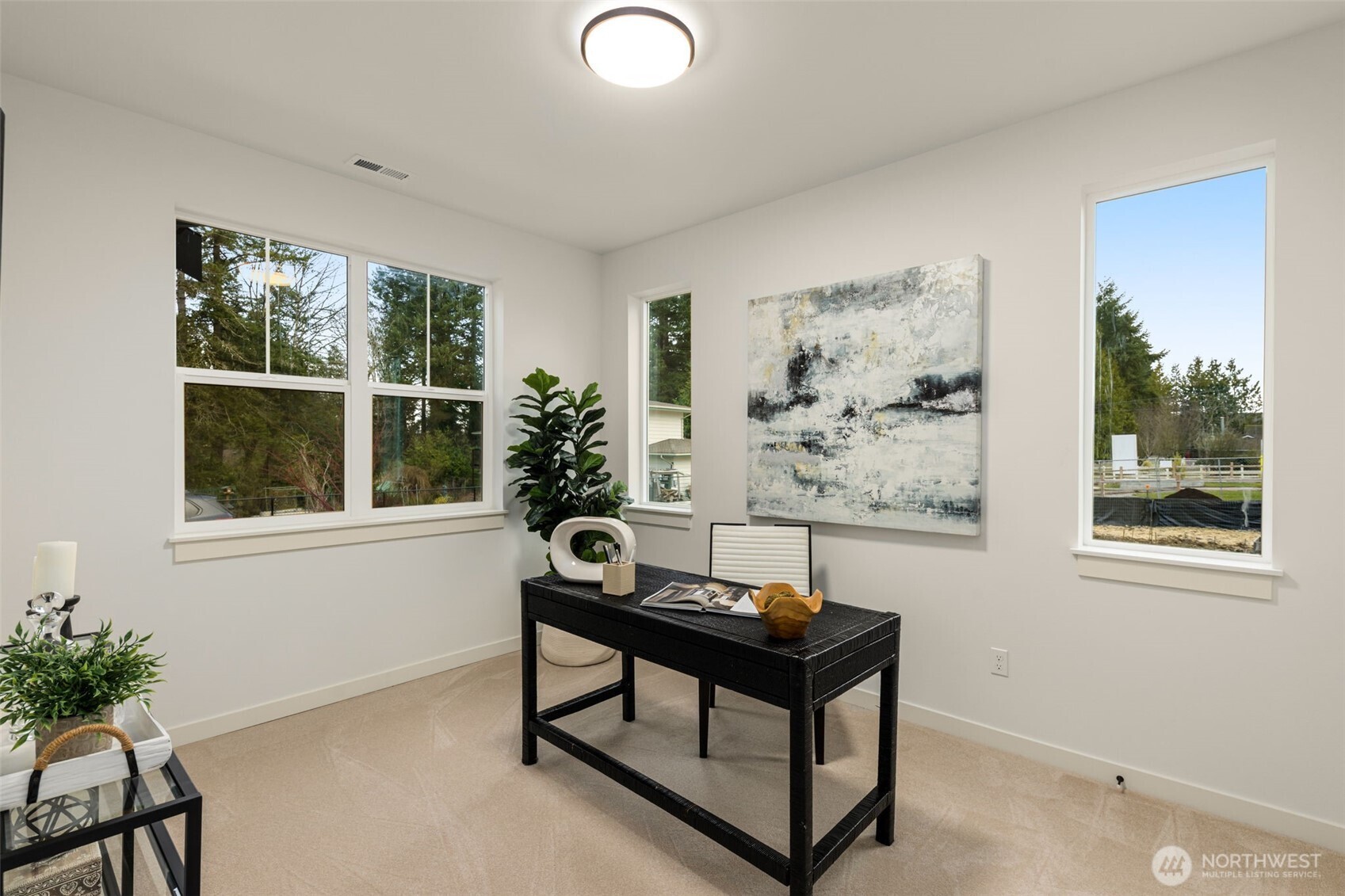 Photos of completed model on homesite #11 with identical floorplan.