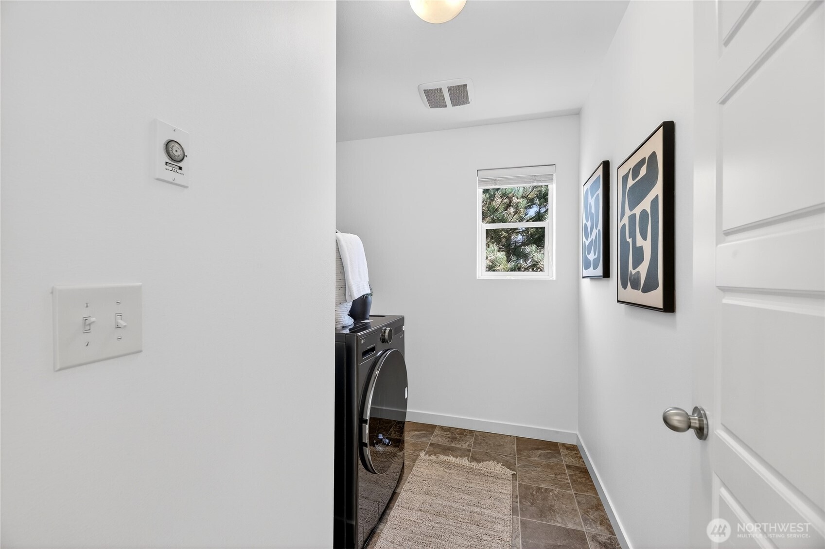 Laundry Room features a brand new All-In-One Combo Washer/Dryer.