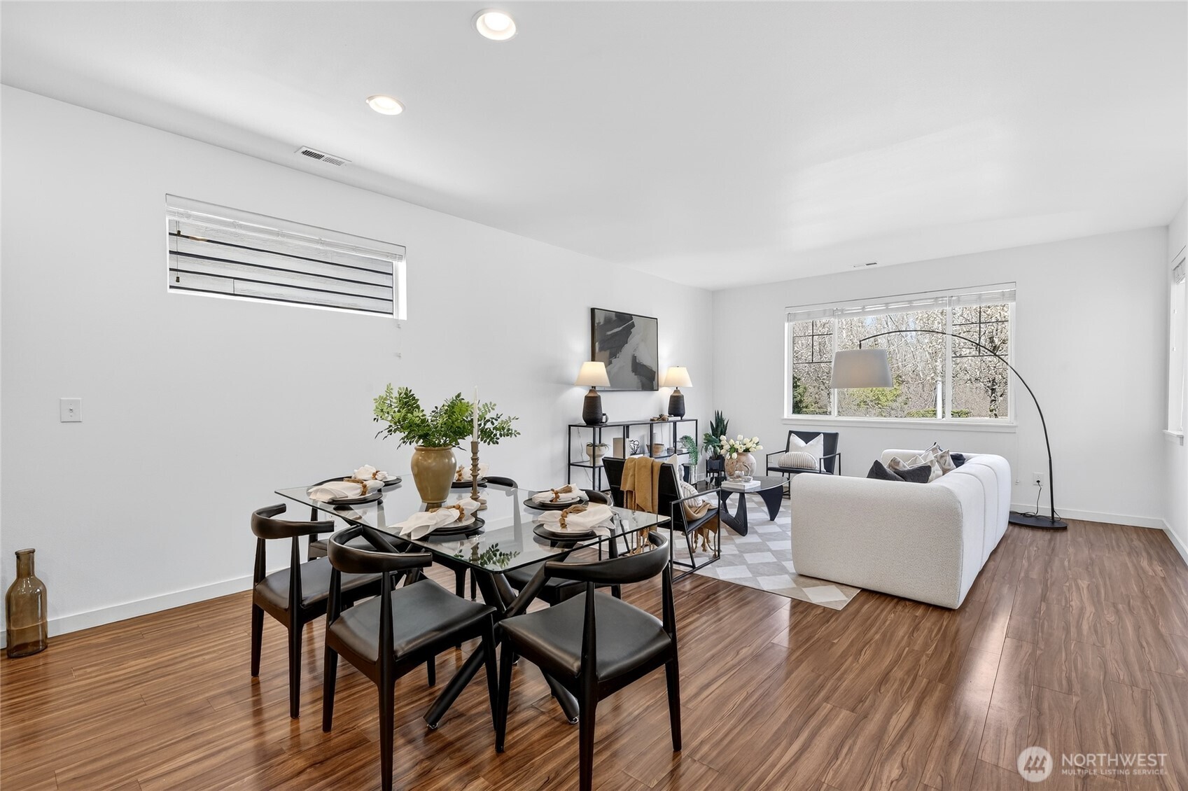 Dining  & Living Rooms.  1st Floor was beautiful LVP flooring.