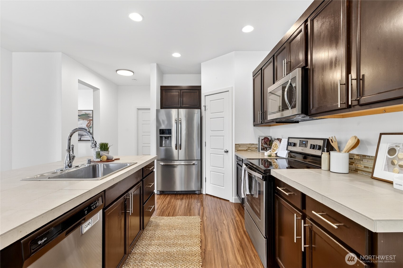 Kitchen features Stainless Steel appliances, plenty of storage and a pantry