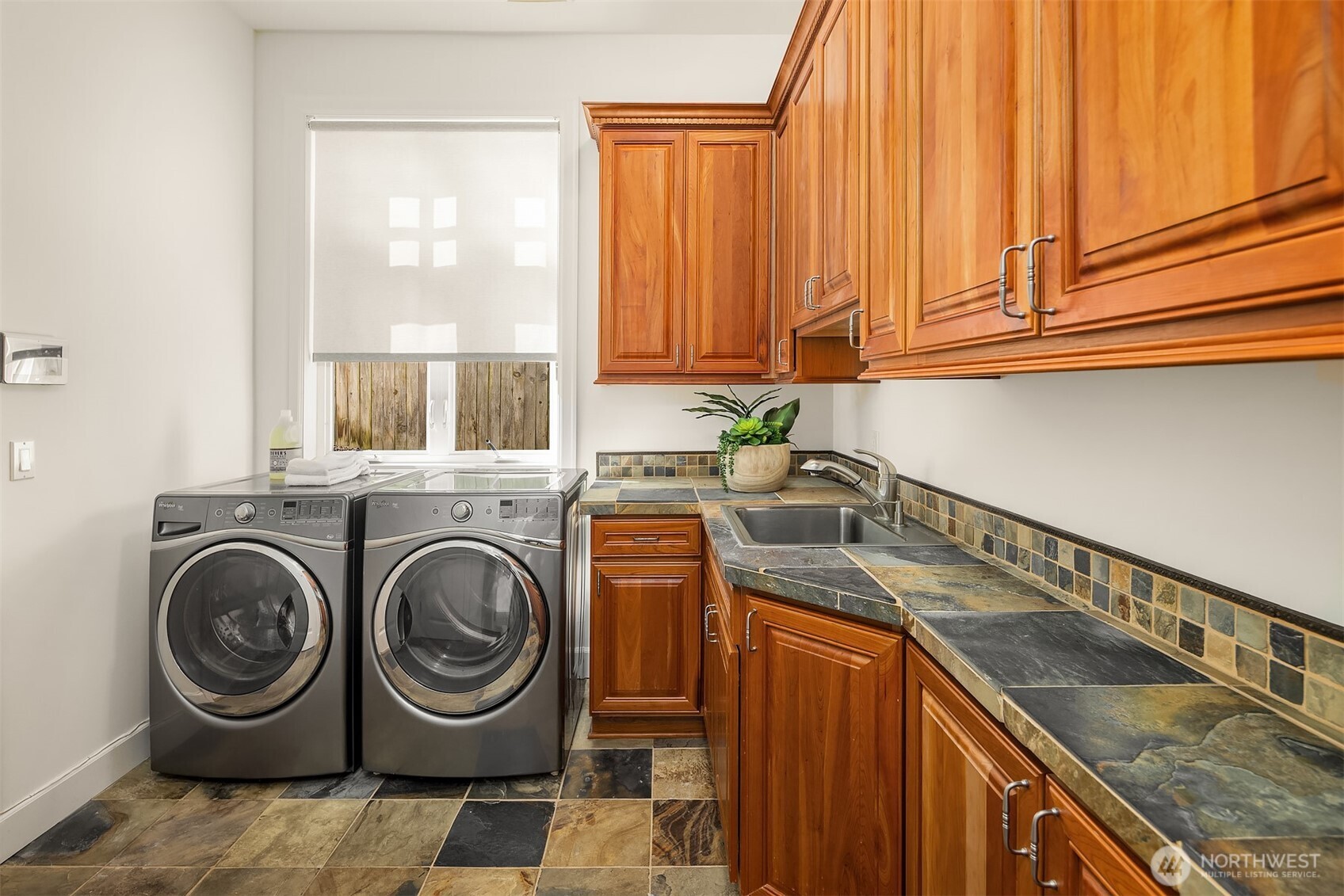 Main floor laundry room completes this level.