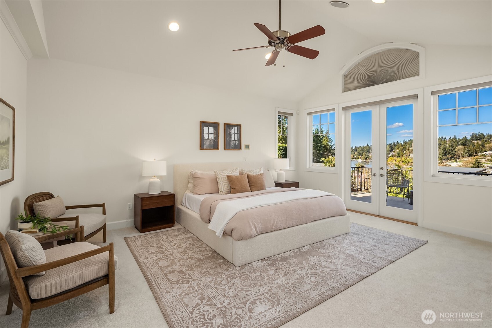 Upstairs, the primary suite captures iconic views of Lake Washington and Bellevue’s skyline.