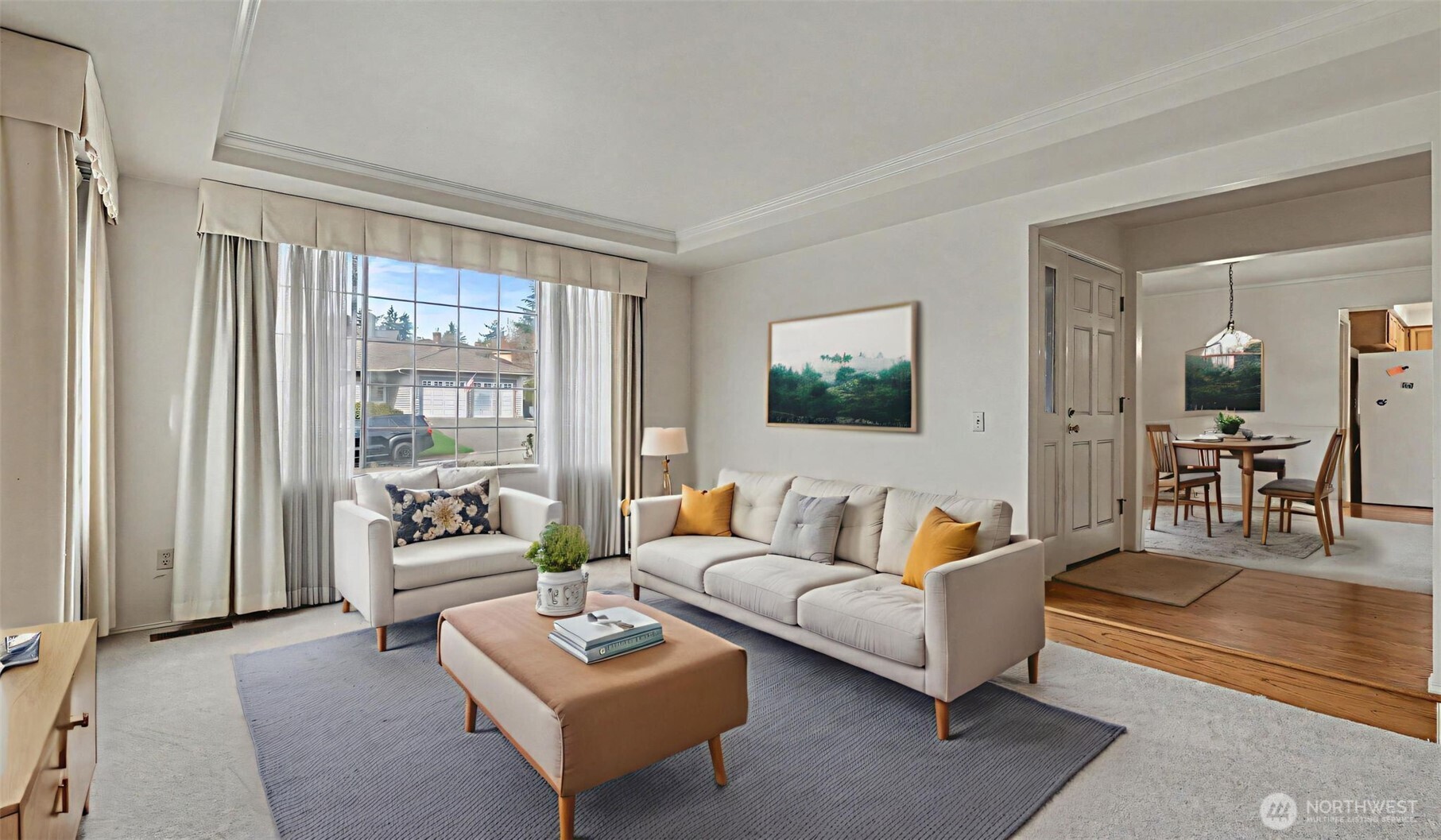 Formal living space with 2 large windows and ample natural light