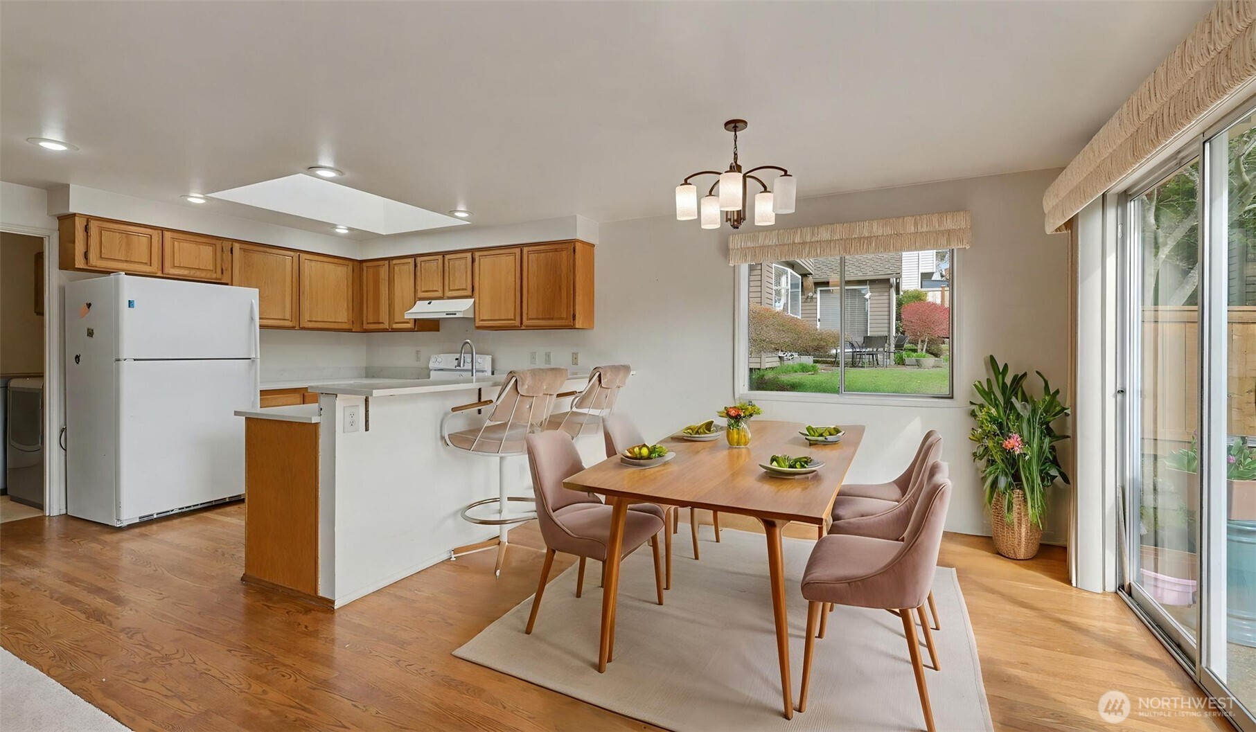 This kitchen features a less formal dining area as well as bar seating