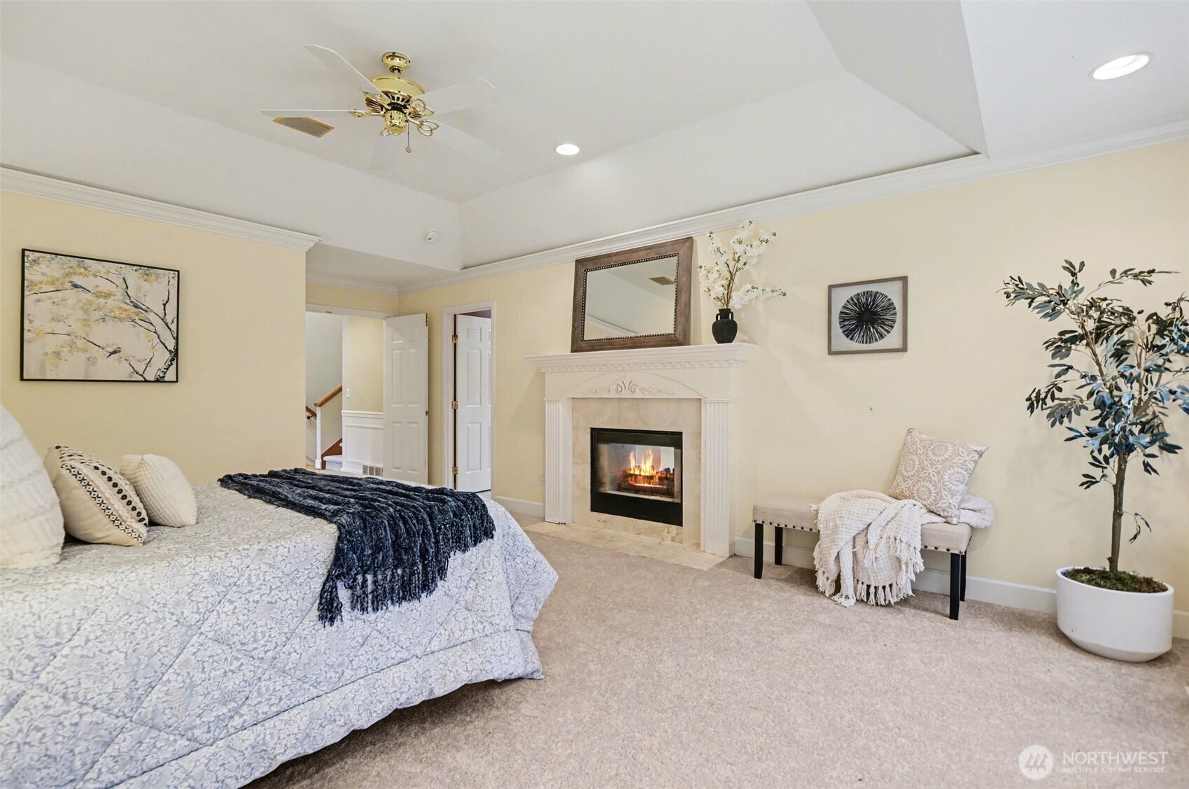 The primary suite offers a peaceful escape, offering a double-sided fireplace, a large walk-in closet, 5-piece bathroom and complemented by a private office and tranquil outlooks.