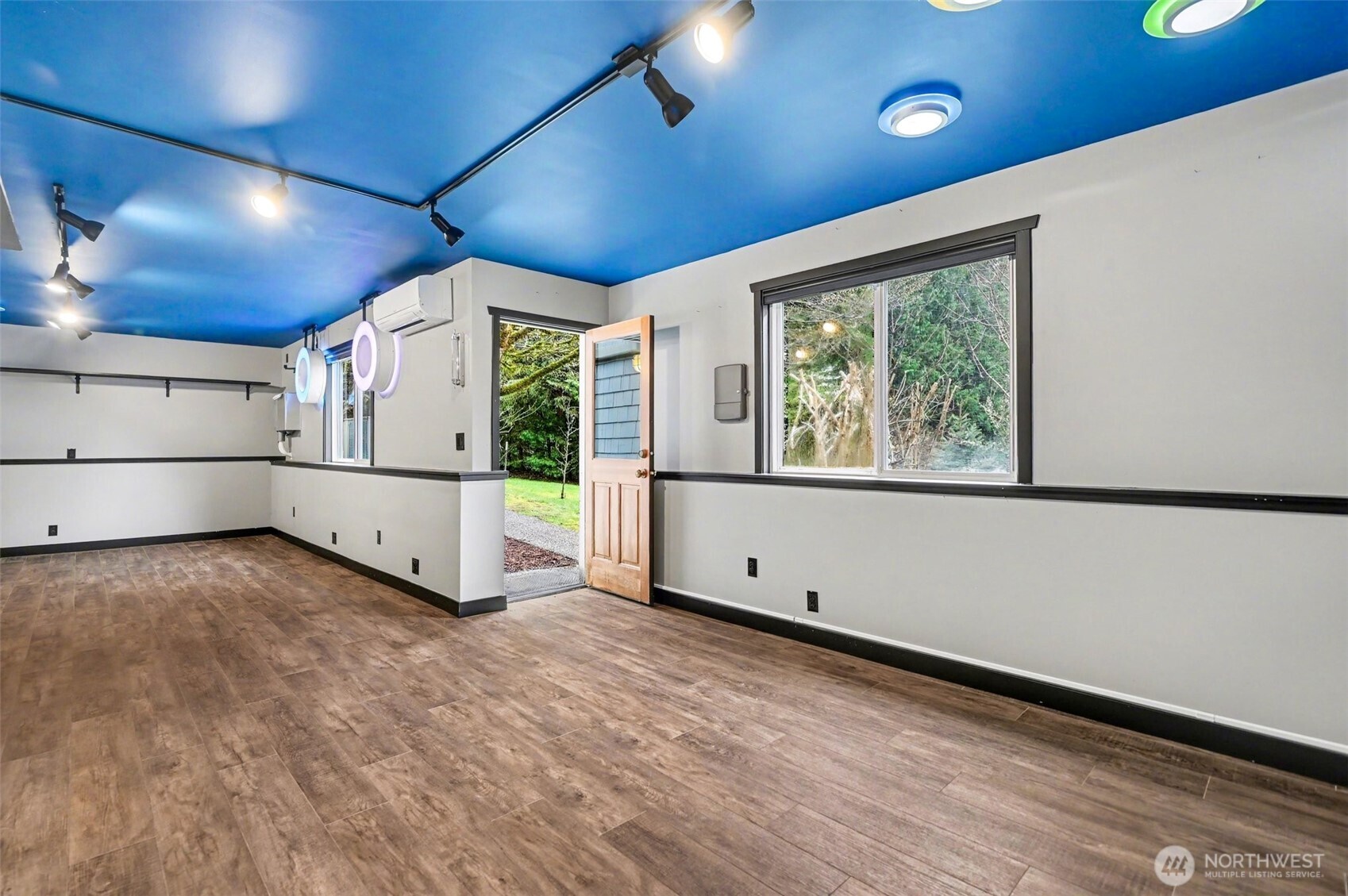 NEW lower level game room with yard access.
