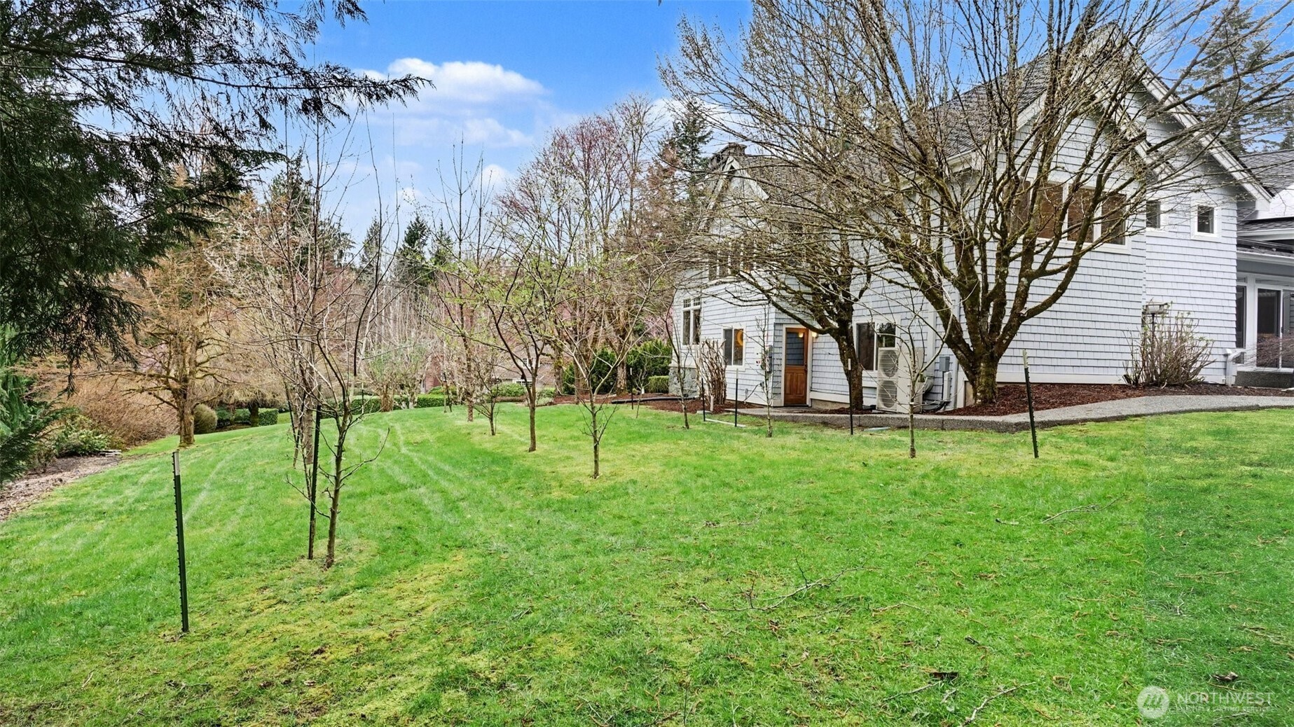 Set on 1.2 acres, this Northwest Craftsman-inspired estate offers a rare sense of privacy, surrounded by natural beauty and serene evergreen views.