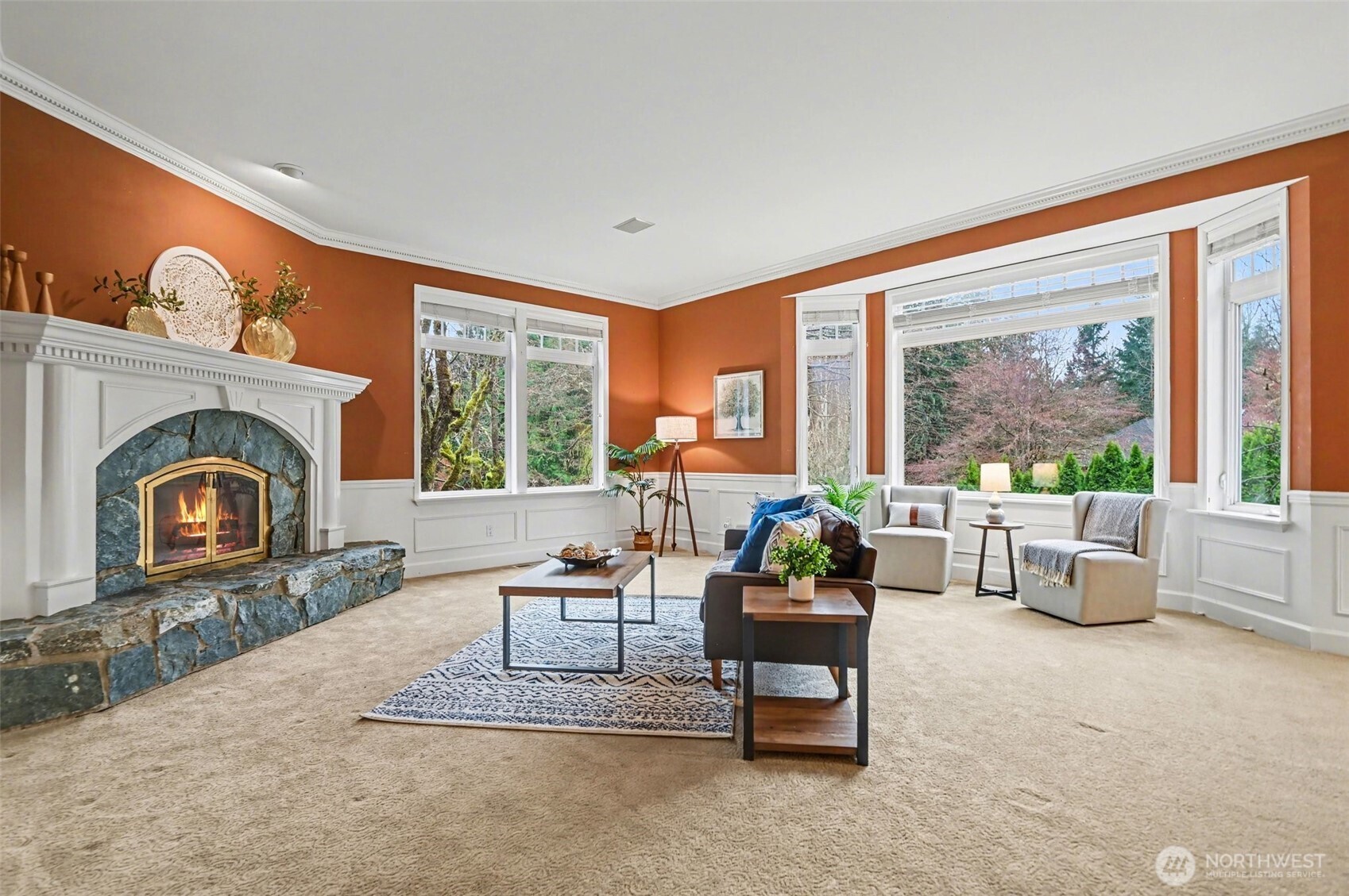 This new sunroom is designed to let the outdoors in! It is adjacent to the great room and dining room.