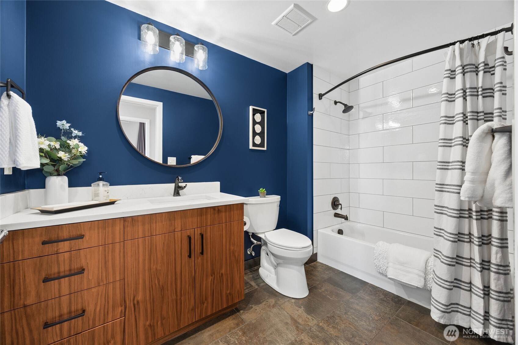 The second bathroom is just across the hall from the bedroom.