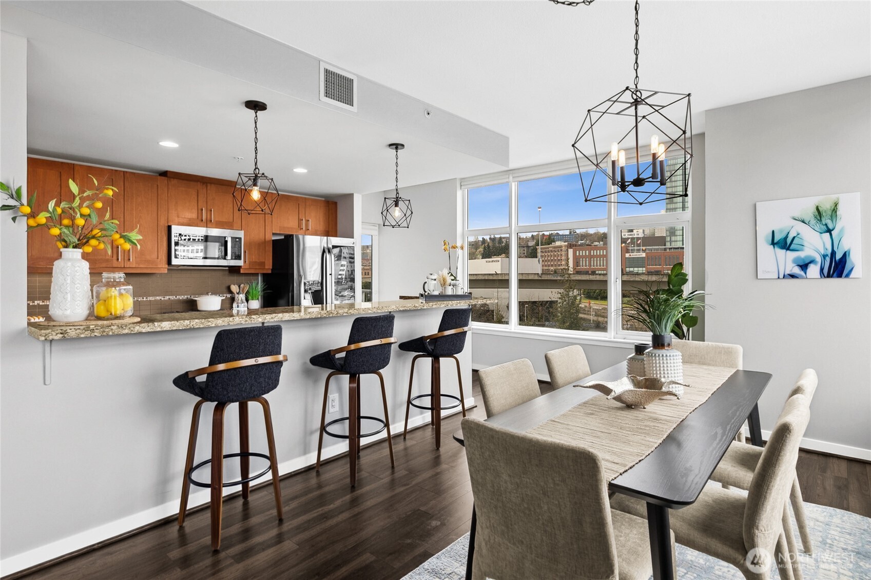 The dining room window invites you to take in the city views of the UW Tacoma and the urban life beyond.