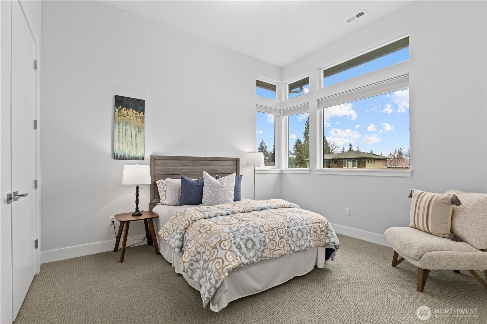 Upstairs Bedroom 2 - Bright, serene, and generously scaled, this secondary bedroom offers comfort, natural light, and a quiet sense of sophistication.