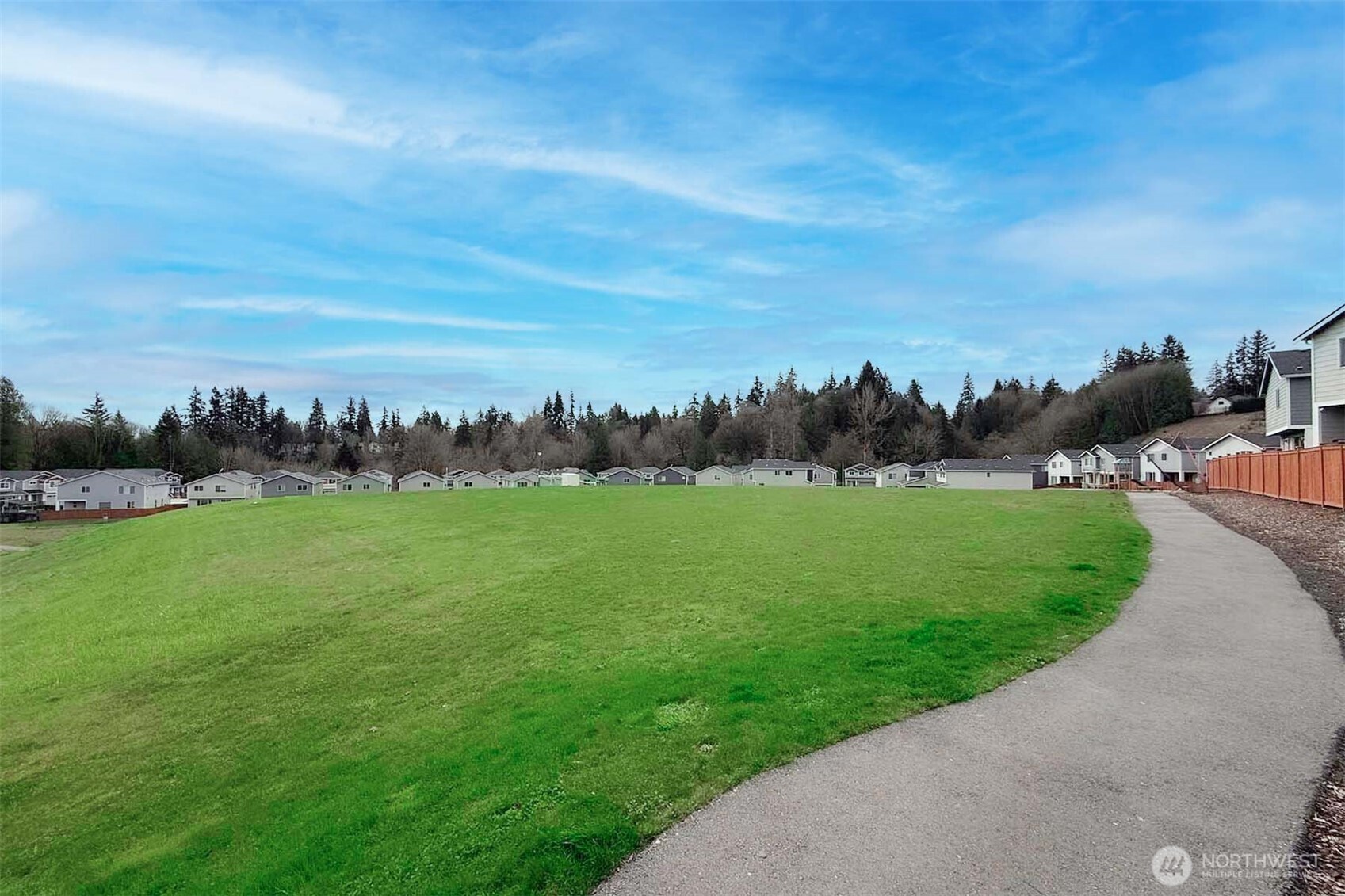 Scenic walking trails and greenbelt areas surrounding the Alpine Estate community.