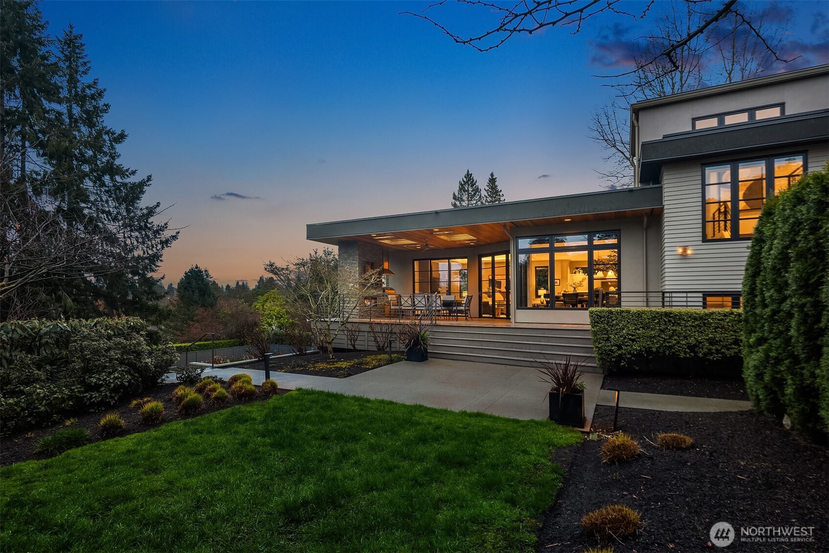 Spill out to exceptional outdoor living spaces designed by Mark Garff.