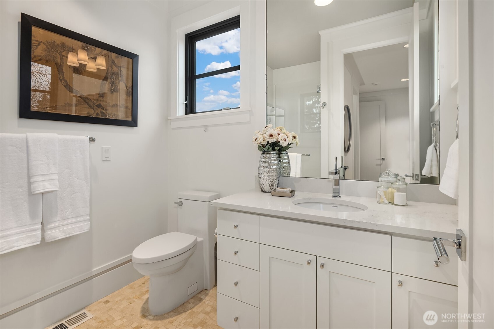 All upper bedrooms feature en-suite baths and walk-in closets.